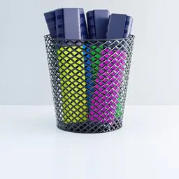 Realistic Blender 3D render of a mesh pen holder with colorful markers for office and design visualizations.