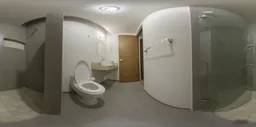 Interior HDR image showcasing lighting and shadows in a modern bathroom with fixtures visible.