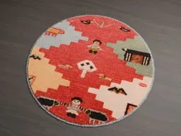 Round, patterned 3D rug model with playful motifs, optimized for Blender rendering, suitable for interior visualization.