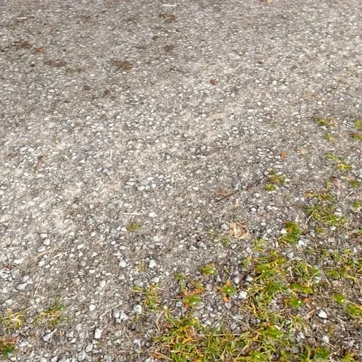 Low-poly 3D model texture of a gravel walkway, ideal for Blender cityscape designs with realistic 12K surface details.
