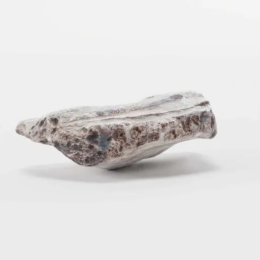 Detailed 3D beach rock model with realistic textures, suitable for Blender landscape scenes.