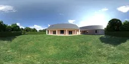 360-degree HDR image of a serene garden with house, green lawn, trimmed hedges, and purple flowers for scene lighting.