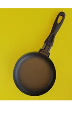 Detailed 3D render of a non-stick frying pan with a black handle, ideal for Blender 3D culinary scenes.