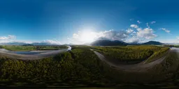 Sunset illuminating river with mountain backdrop in a high dynamic range scenery for lighting simulations.