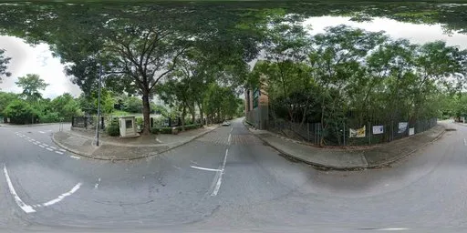 Lush green foliage lining an urban street scene in a high-dynamic-range image for realistic 3D lighting.