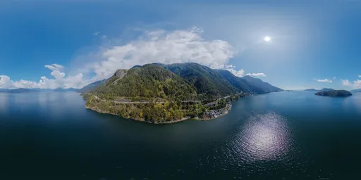Aerial Sunny Sky with Mountains & Ocean