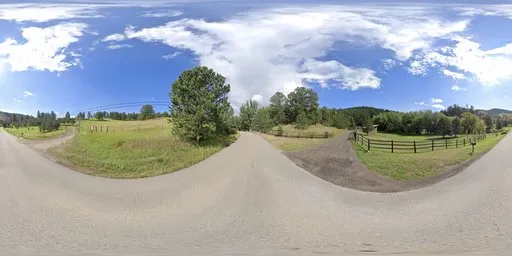 360-degree HDR panorama of a sunny countryside road with clouds and greenery for scene lighting.