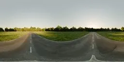 360 HDR panorama of a morning scene with a curving road amid greenery for scene lighting.