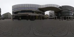 360-degree panoramic HDR image of Schadowplatz, featuring a cityscape with modern architecture and overcast sky.