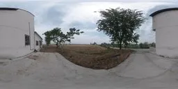 Scenic HDR image featuring green trees and open fields under overcast skies for realistic scene lighting.