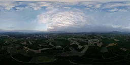Cloudy at sunset in farmland