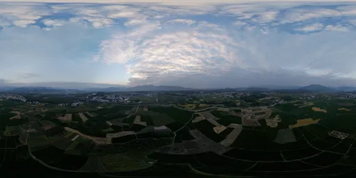 Cloudy at sunset in farmland
