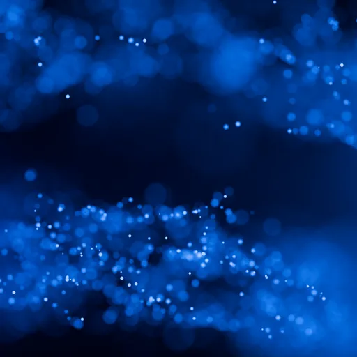 Cinematic Glowing Blue Particle Bokeh