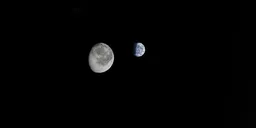 Moon and Earth in Space