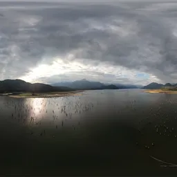 Lake and Mountains Cloudy Sky