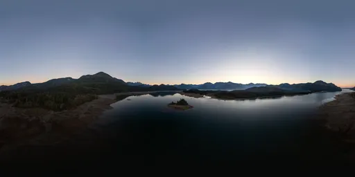 High-resolution aerial HDR panorama of a tranquil lake during twilight with clear sky gradient reflections for scene lighting.