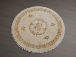 Oval Persian rug 3D model with intricate beige and brown patterns, optimized for Blender rendering.