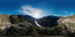 High-resolution HDR panorama of a sunlit mountainous valley with a winding river, ideal for realistic 3D scene lighting.