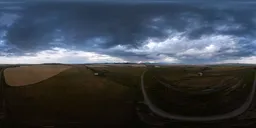 360-degree HDR panorama of dark clouds and landscape, ideal for realistic 3D scene lighting.