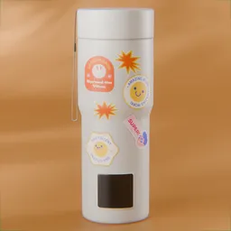 Detailed 3D model of a white electric kettle with colorful decals, compatible with Blender for rendering and animation.