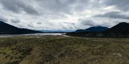 Overcast Sky River and Mountains