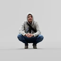 Guy in hoodie squatting