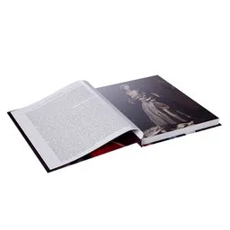 "Decorate your environment with this stunning 3D model of an open hardcover book featuring a limited edition print by Mat Collishaw. Made with Carrara marble and rendered with V-Ray, this book model is part of the Literature category on BlenderKit and perfect for use in medium format film photography scenes or as a trending piece in art forum displays."