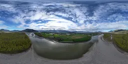 360-degree HDR image featuring a sunny valley with mountains and clouds, ideal for scene lighting.