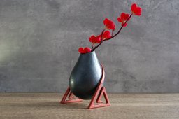 Footed bulb shaped vase
