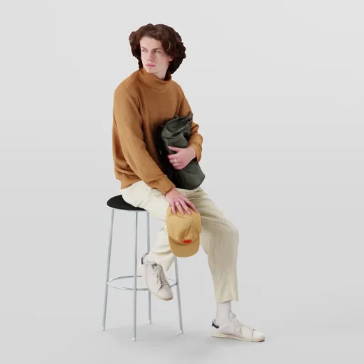 Curly guy on a bar stool