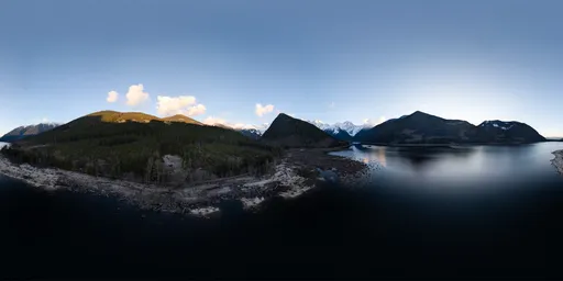 360-degree HDR panorama featuring serene sunset over mountains and a reflective lake for realistic scene lighting