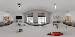 360-degree HDR showing a well-lit conference room with a white table, black chairs, decorative apples, TV, and paintings.