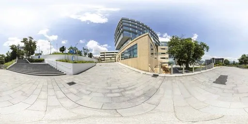 4K urban HDR image of reflective glass building exterior with clear skies for scene lighting.
