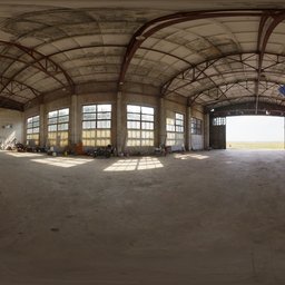 360-degree HDR panorama of an industrial hangar interior with natural lighting for scene illumination.