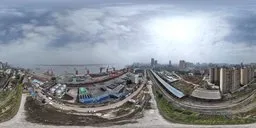 High-altitude urban pier HDR with dynamic clouds for realistic scene lighting.