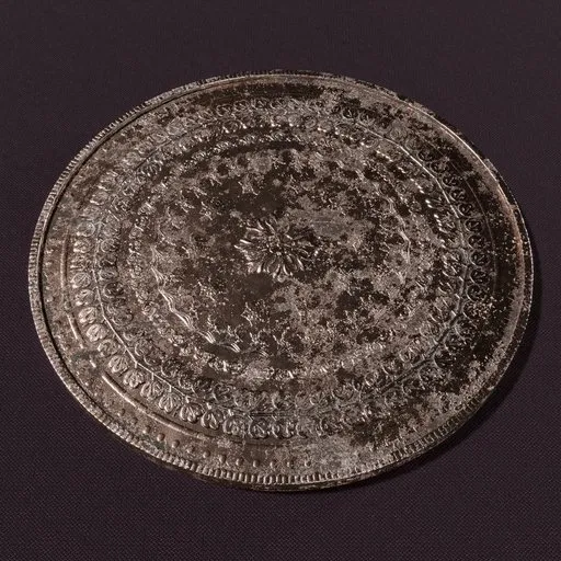 Highly detailed copper coin 3D model with ornate engravings, aged texture, and edge displacement, made in Blender.