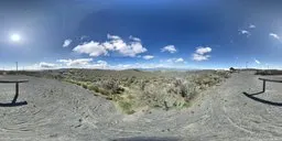 360-degree HDR panorama of open landscape with clear blue sky and fluffy clouds for realistic lighting in 3D scenes.