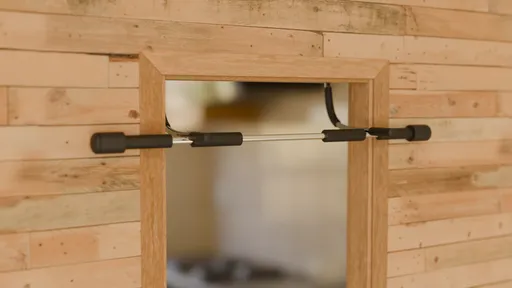 Blender 3D-rendered home exercise equipment showcasing a doorframe-mounted pull-up bar in a domestic setting.