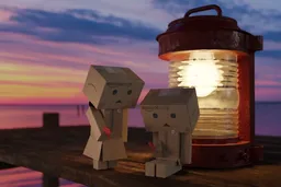 Cardboard couple on the pier