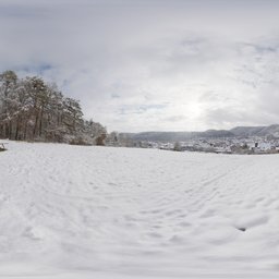 Snow-covered landscape HDR panorama with cloudy skies for 3D scene lighting