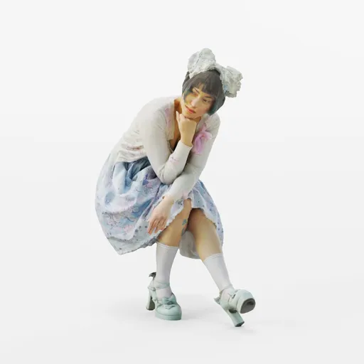 Seated kawaii girl in blue dress