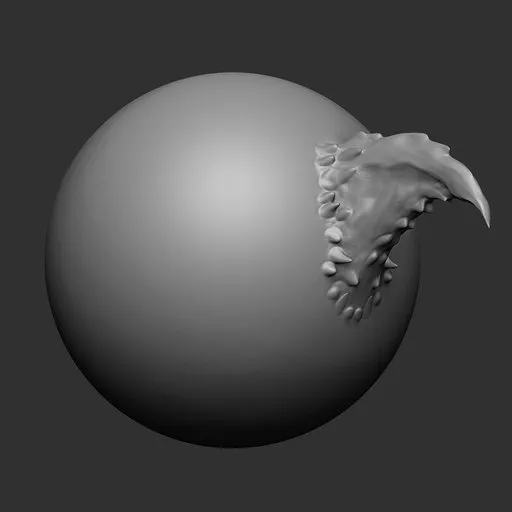 3D Blender sculpting brush imprint with dragon scale texture effect for model detailing.