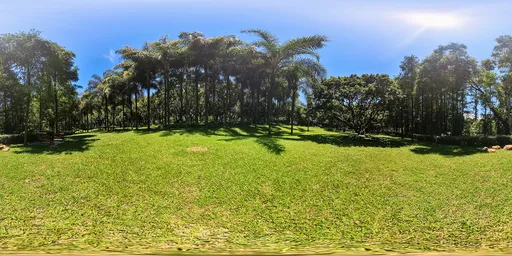 Lush tropical HDR panorama for 3D scene lighting, featuring vibrant greenery and clear blue skies.