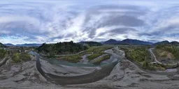 360-degree view of a river winding through a mountainous landscape under a cloudy sky, suitable for HDR scene lighting.