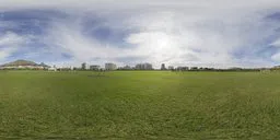 360-degree HDR panorama of a grassy indoor park with cloudy sky for realistic lighting in 3D scenes.