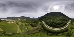 Highway in Mountain Valley Daytime