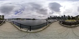 Overcast sky over marina with skyscrapers, ideal HDR for realistic lighting in 3D renderings.