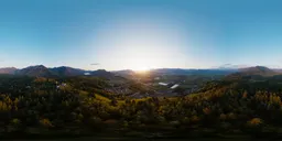 Aerial HDR capturing the radiant sunset over Canadian mountains with dynamic lighting for 3D scene illumination.