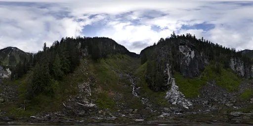 Aerial HDR scenery showing a detailed, rugged valley with mountain terrain, suitable for realistic scene lighting.