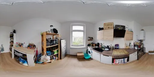 Panoramic HDR Image of a cozy, wood-floored kitchen with cluttered countertops and appliances, natural overcast daylight.